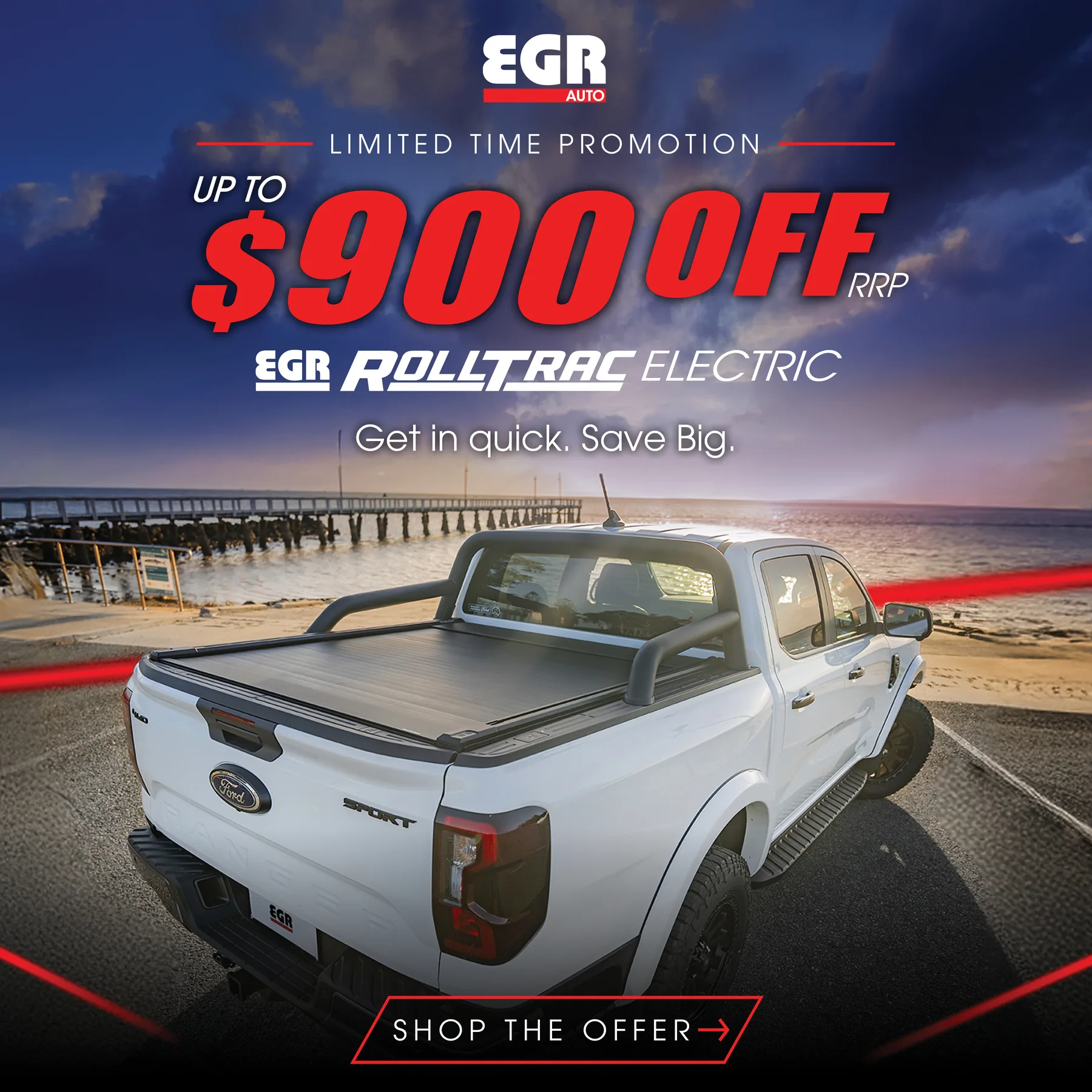Limited time promotion: up to $900 off RRP on EGR RollTrac Electric roller tonneau covers, shown on a white Ford Ranger Sport with sports bar by the beach