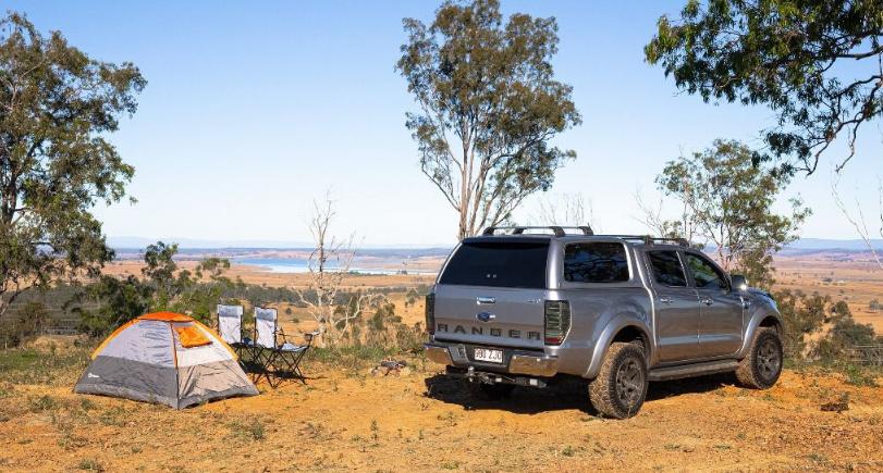 man cleaning his ute