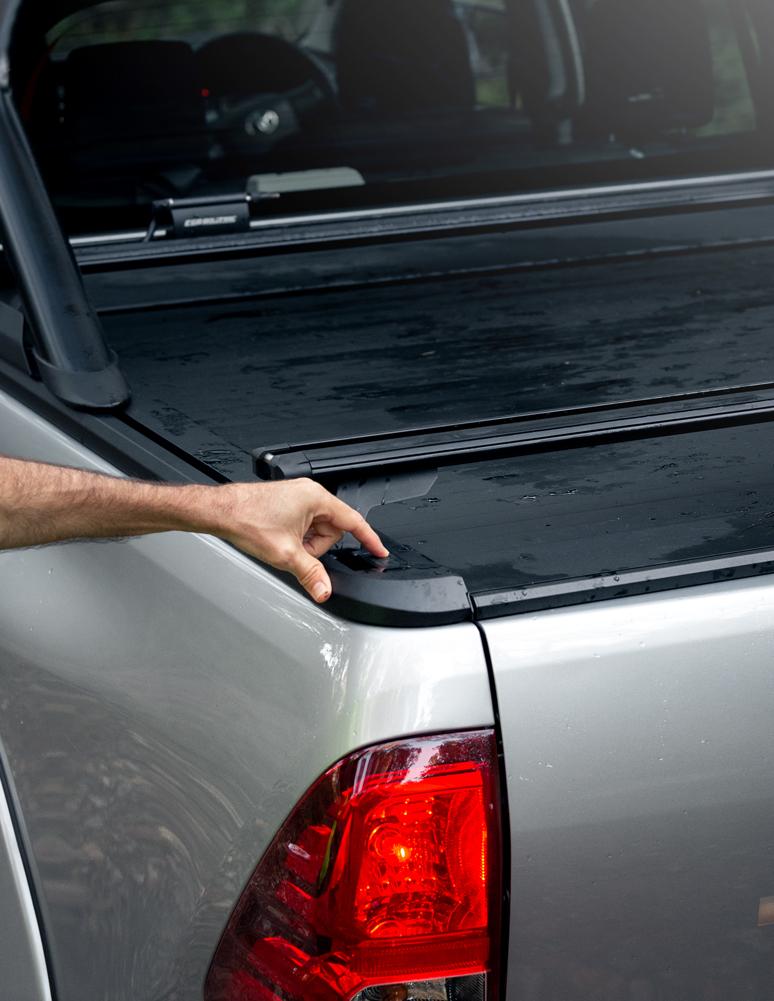 man using EGR Rolltrac on a ute