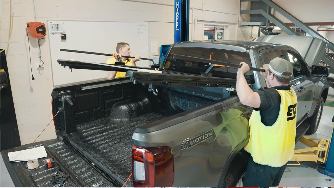 EGR fitment technicians installing an egr rolltrac