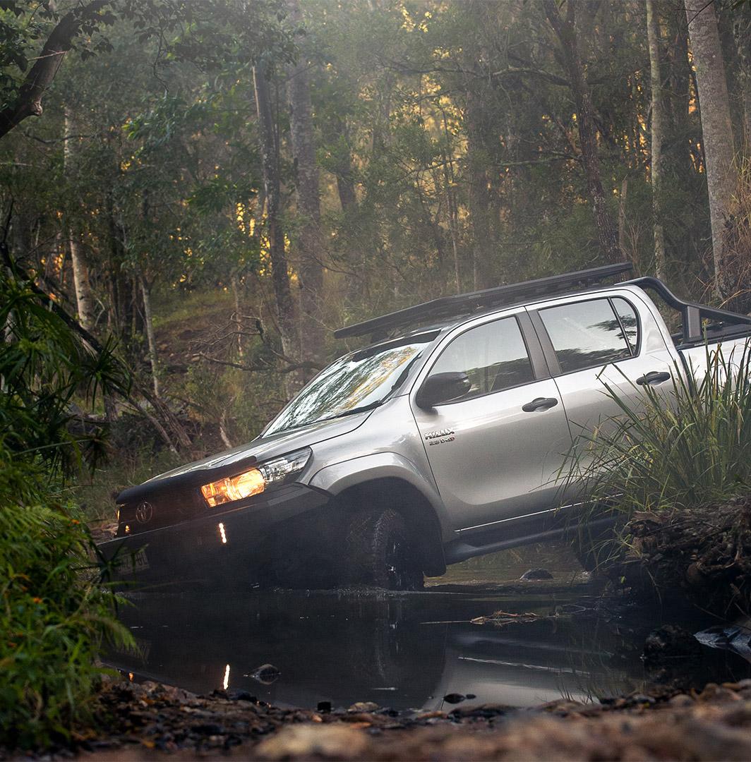 man cleaning his ute