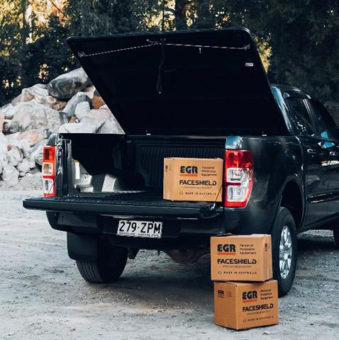 egr load shield open for loading on a gray ute