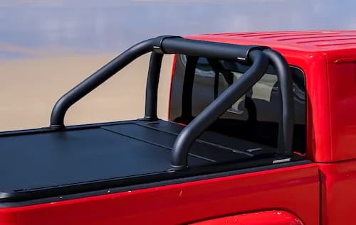 Red ute with an EGR RollTrac sports bar accessory mounted on the tray