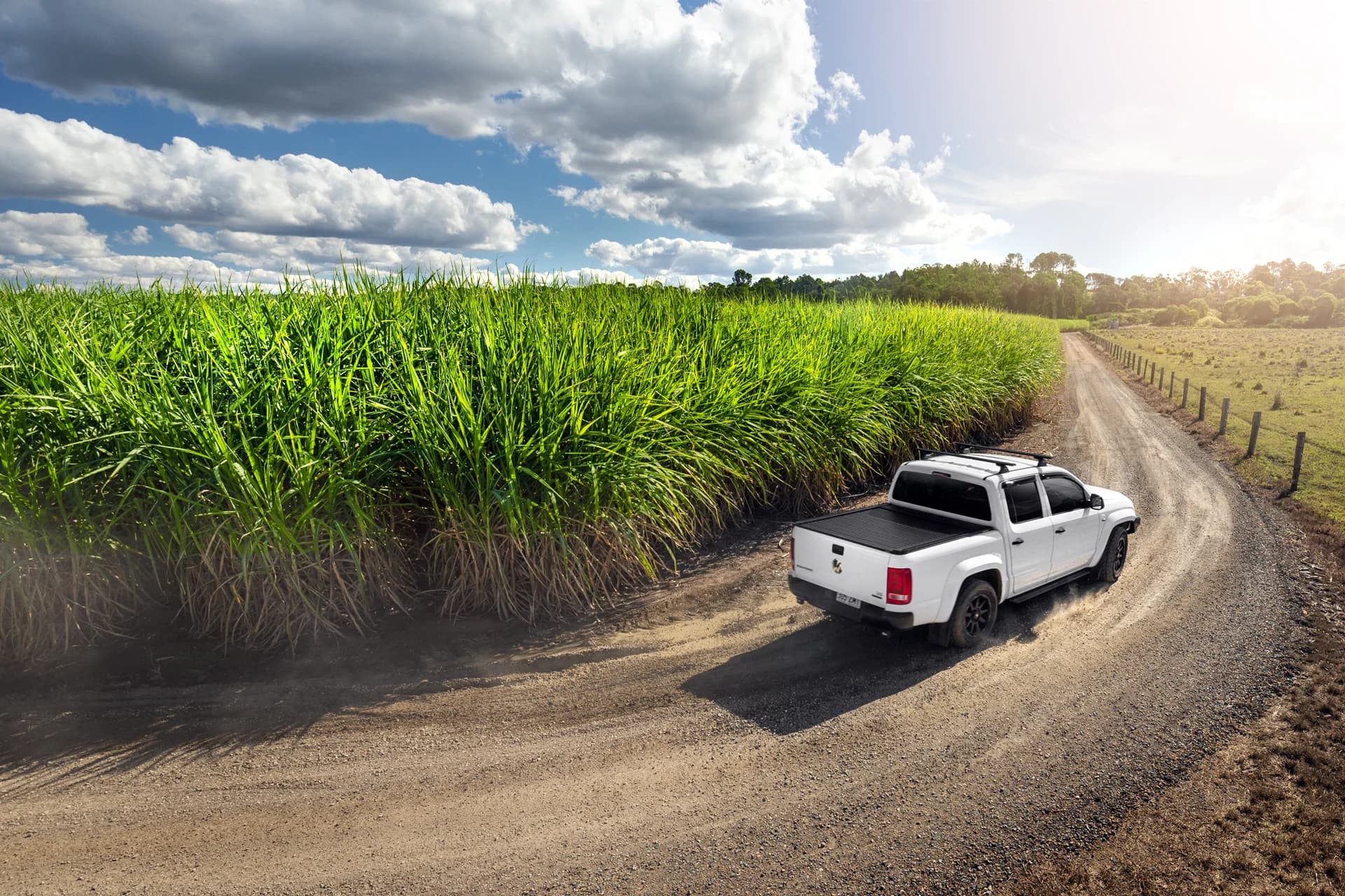 Ute with EGR RollTrac driving on a country dirt road