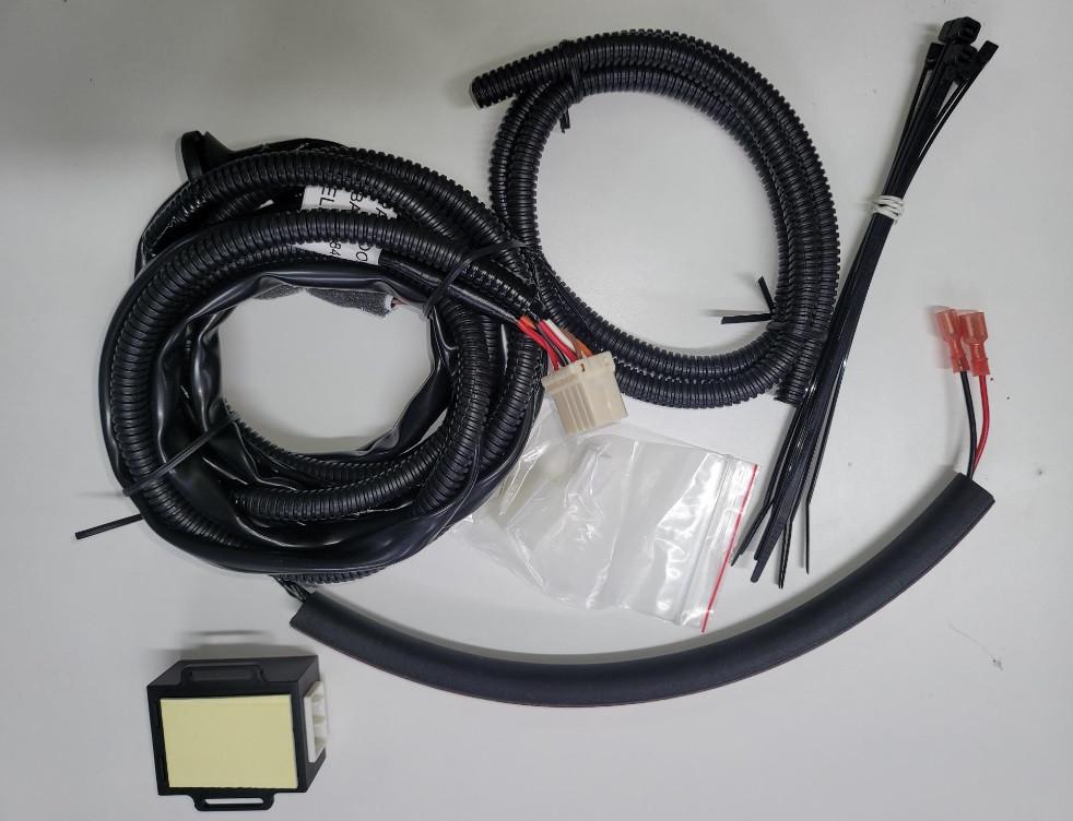 EGR vehicle wiring harness for Mazda BT-50 2011–2019 Premium Canopy, showing wiring loom, connectors, conduit tubing, control module, and cable ties for canopy electrical integration