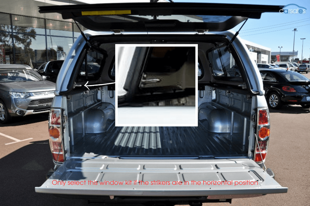 Inside view of EGR Premium Canopy rear door upgrade kit showing latch strikers positioned horizontally for correct alignment and smooth door operation