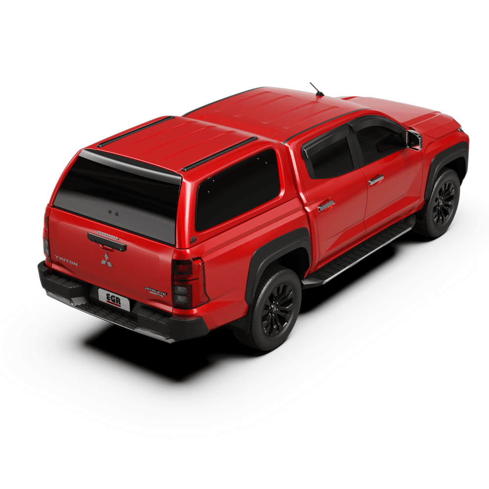 Angled view of Mitsubishi Triton MV 2024 with EGR Gen3 canopy, showing modern styling, roof track system, and secure cargo enclosure