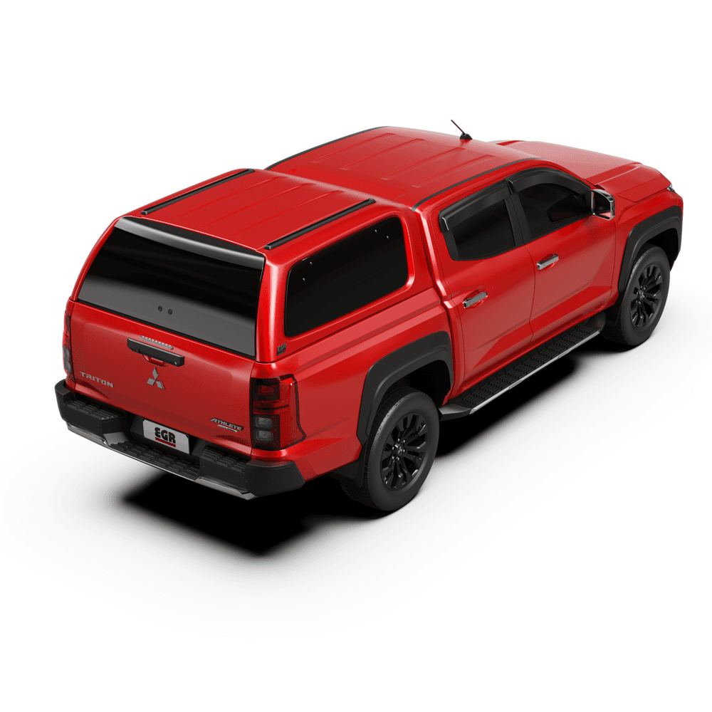 Angled view of Mitsubishi Triton MV 2024 with EGR Gen3 canopy, showing modern styling, roof track system, and secure cargo enclosure