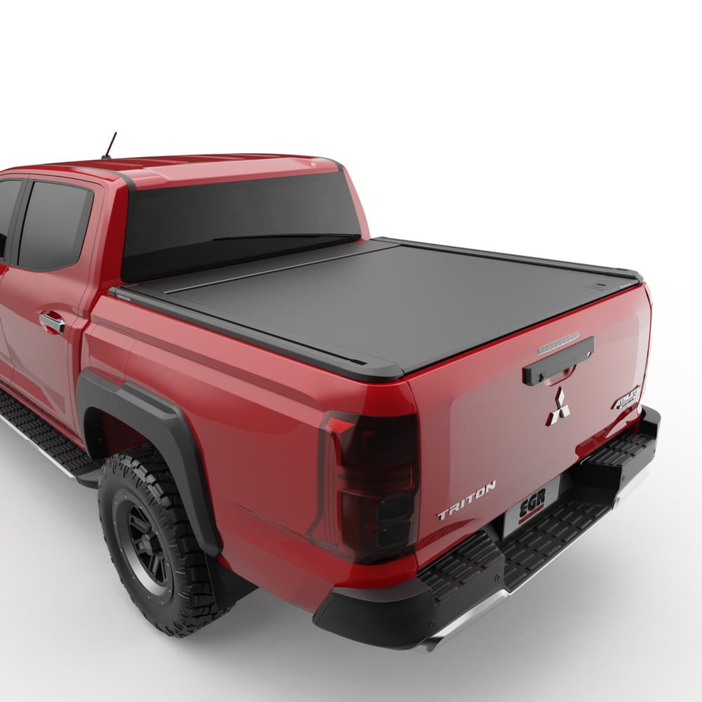 EGR RollTrac Manual tonneau cover on Mitsubishi Triton MV 2024, highlighting durable aluminium slats and weather-resistant powder-coated surface