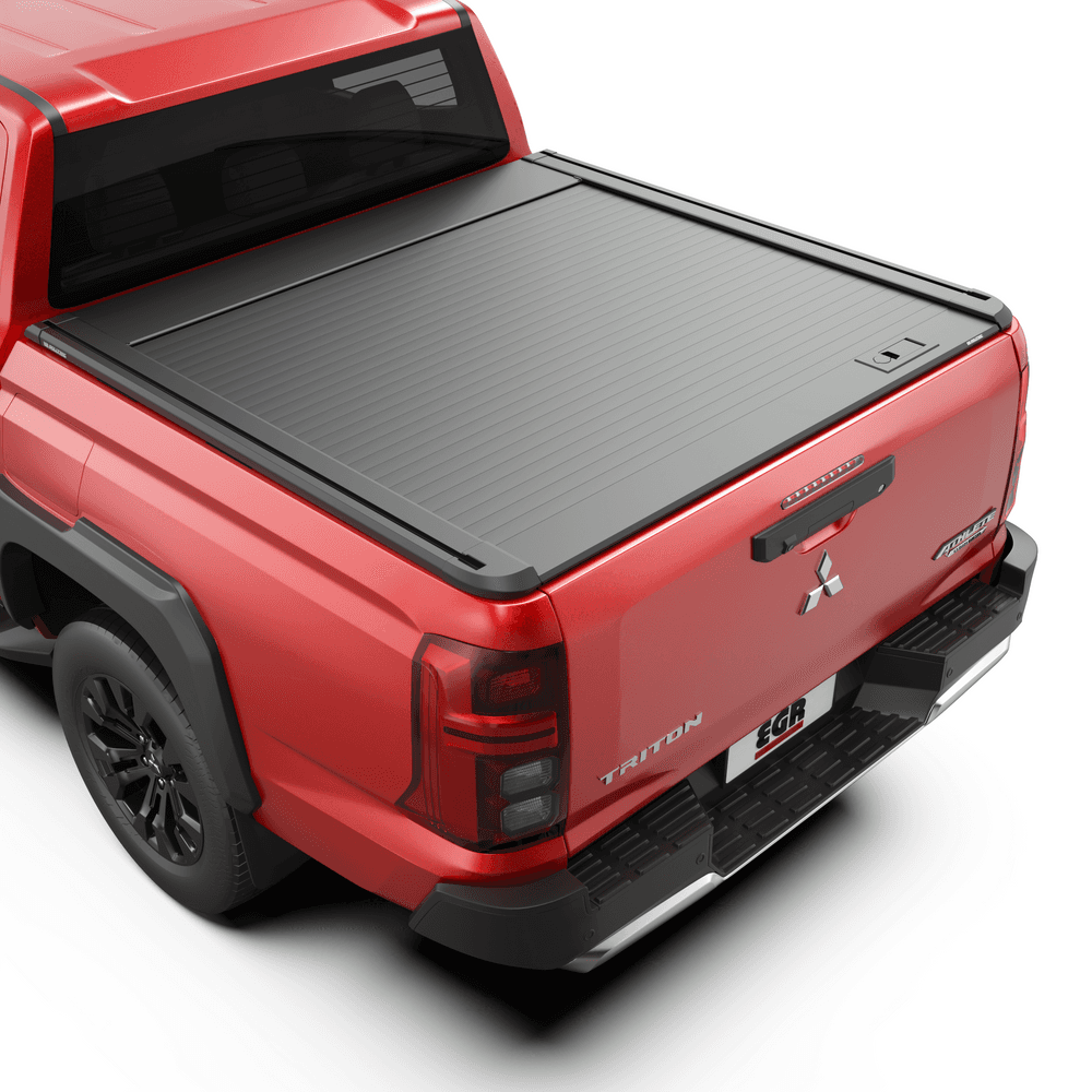 Mitsubishi Triton MV 2024 with EGR RollTrac Manual roller tonneau cover installed, showing secure aluminium slat design and low-profile black finish