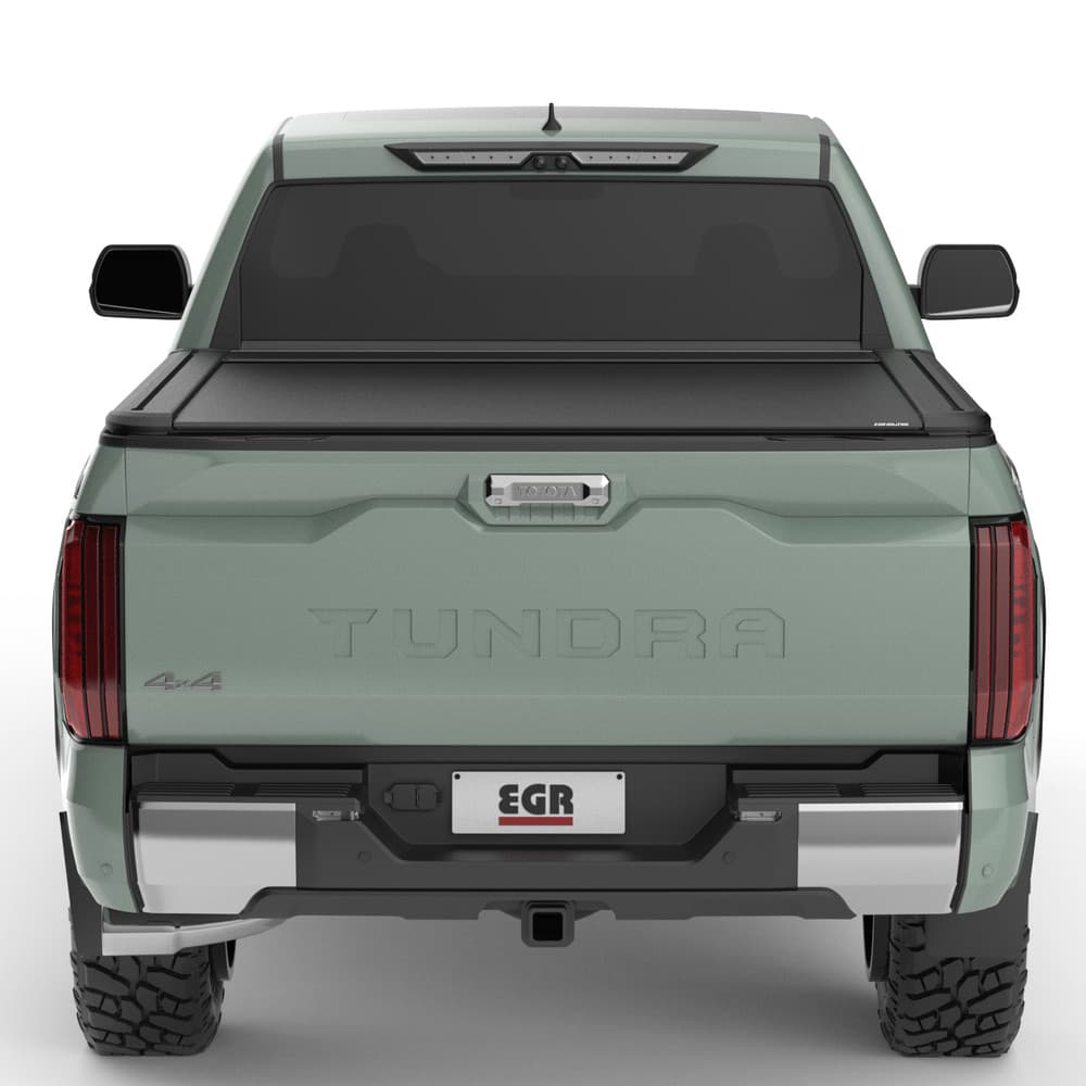 Rear view of Toyota Tundra RollTrac Electric E3 tonneau cover, showing secure locking system and clean tub integration