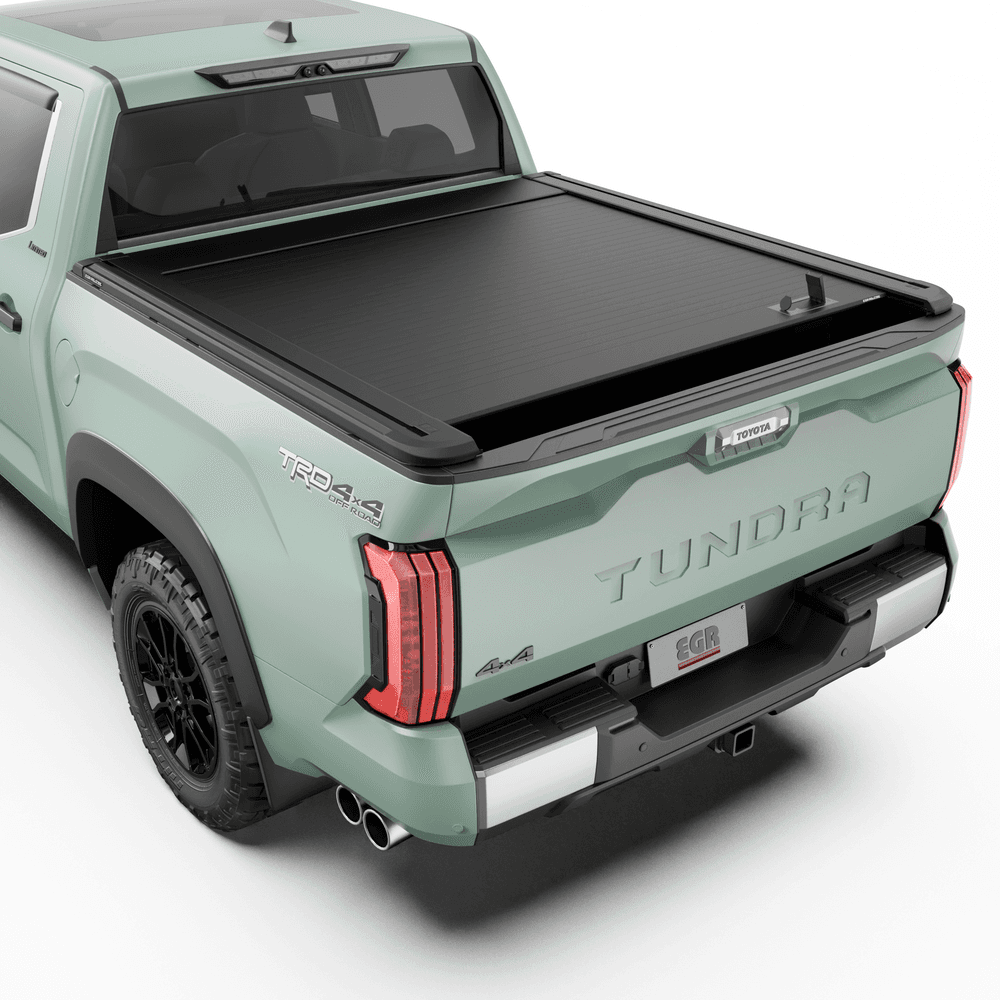 Toyota Tundra 2024 fitted with EGR RollTrac Manual roller tonneau cover, showing secure aluminium slat tub coverage from rear angle