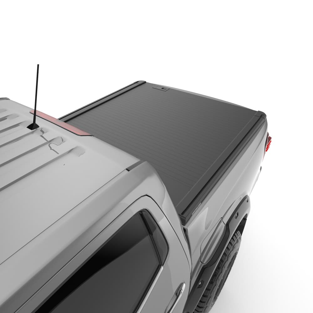 Side view of Nissan Navara 2021-onwards fitted with EGR RollTrac Manual roller cover, demonstrating smooth low-profile tray coverage