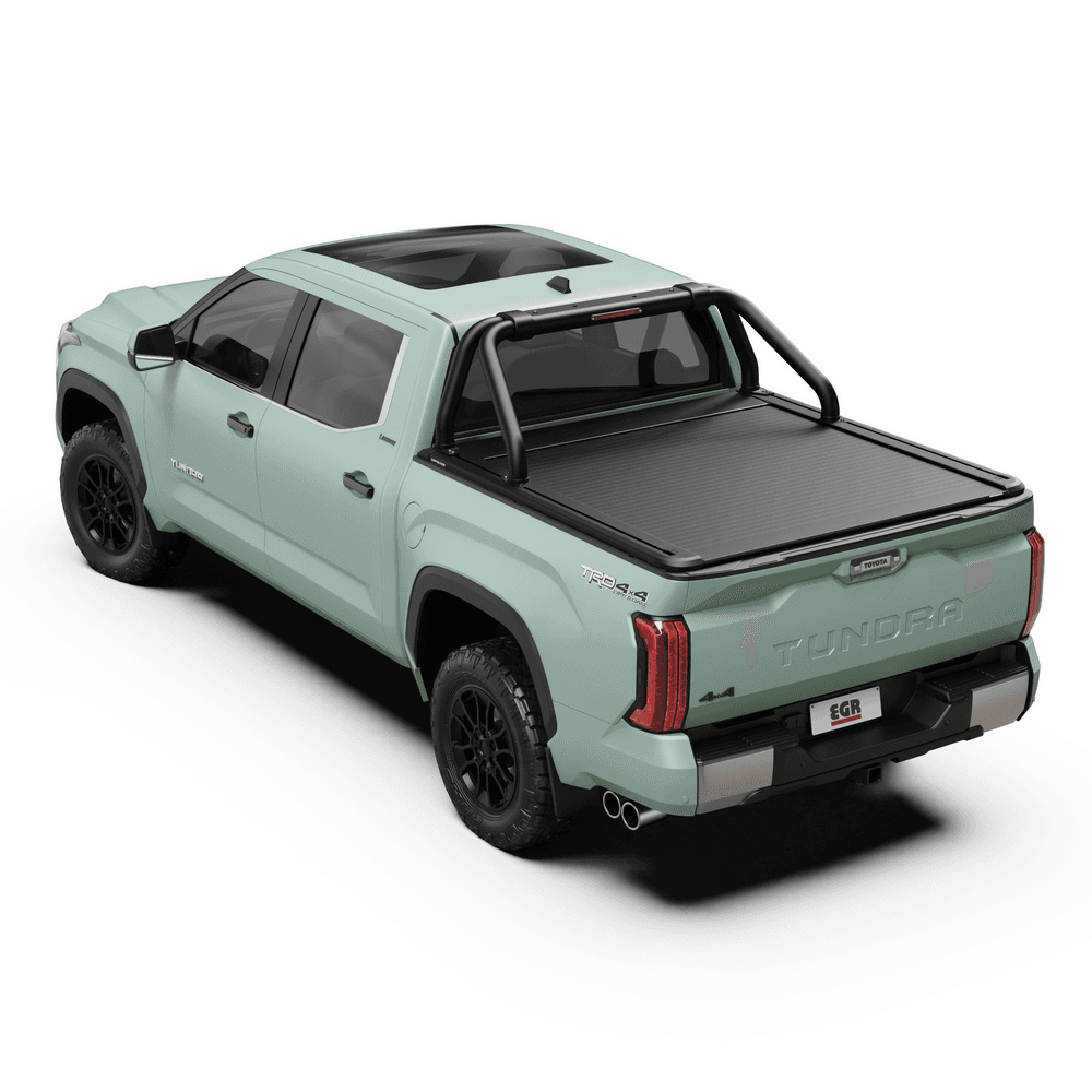 Top-down view of EGR RollTrac Sports Bar mounted on Toyota Tundra, displaying adapter mounting system on RollTrac rails