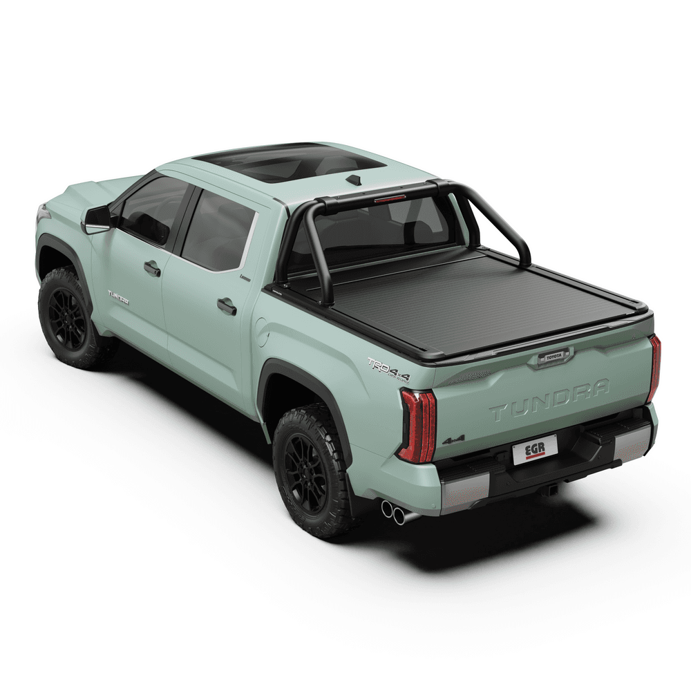 Top-down view of EGR RollTrac Sports Bar mounted on Toyota Tundra, displaying adapter mounting system on RollTrac rails