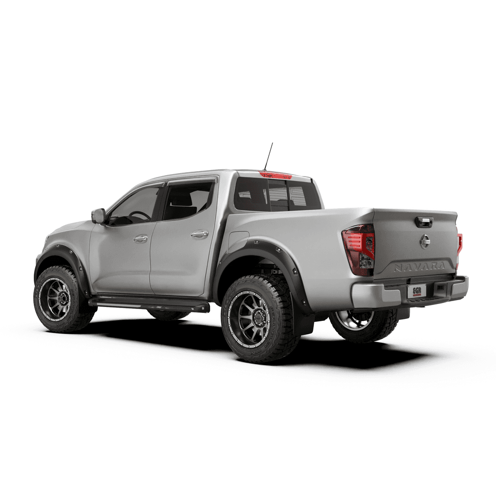 Rear angled view of Nissan Navara with EGR Slimline Weather Shields installed, allowing ventilation while deflecting rain and wind
