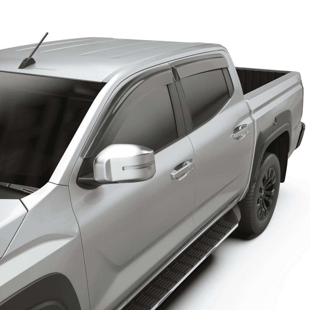 Close-up of Nissan Navara door window with EGR Slimline Weather Shield showing sleek, clamp-on fitment