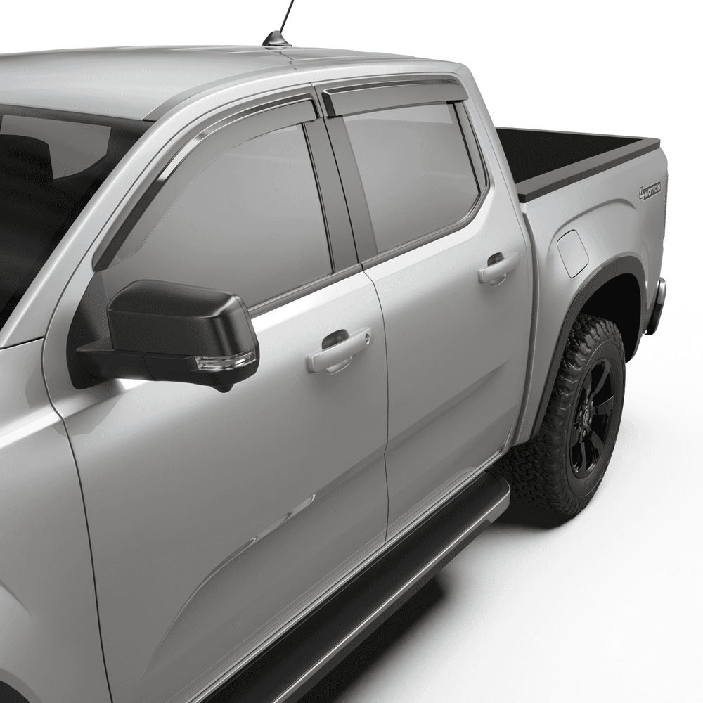 Close-up of Volkswagen Amarok door window fitted with EGR Slimline Weather Shield showing slim, clamp-on design
