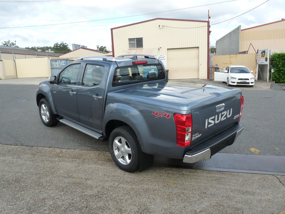 Rear angle view of grey ute with EGR hard lid installed
