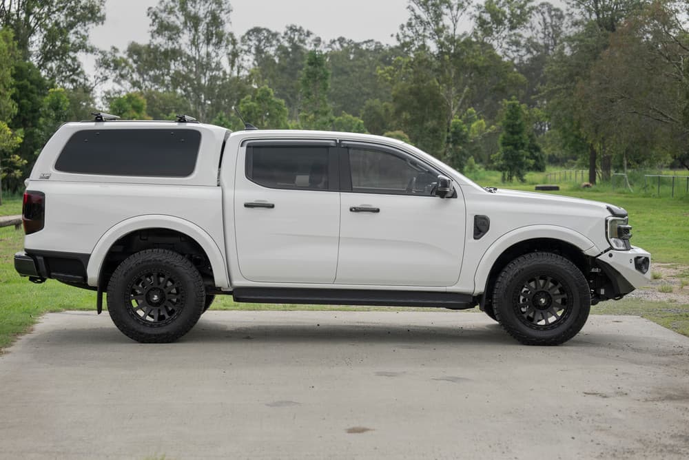 Dual-cab ute fitted with EGR GEN3 canopy crossbar rack kit for carrying tools, camping gear, or rooftop accessories