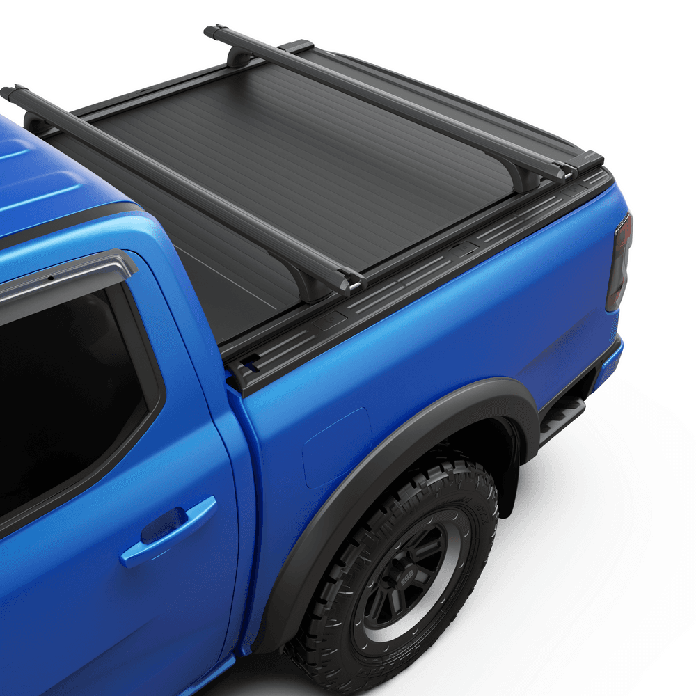 Detail view of black powder-coated RollTrac crossbar showing steel construction and mounting brackets