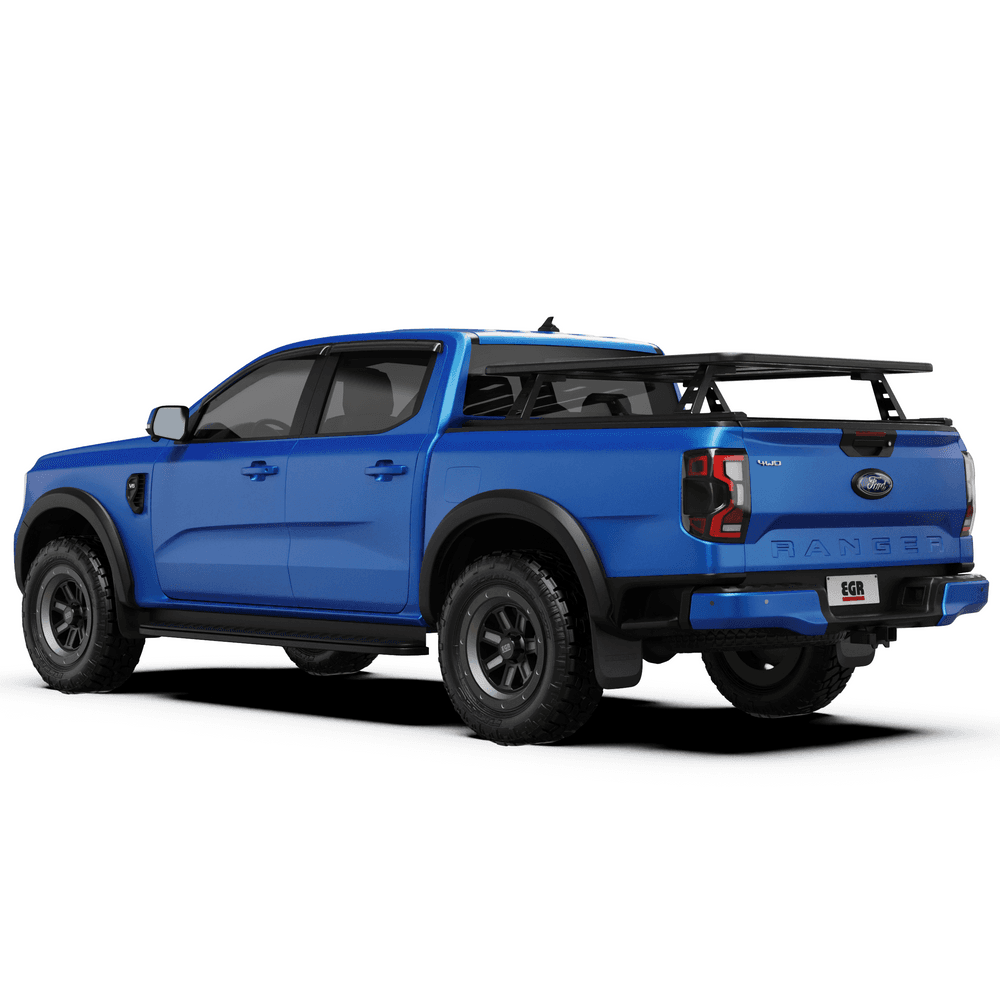 Rear three-quarter view highlighting EGR RollTrac Crossbar Kit positioned over the load bed