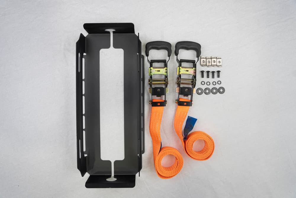 EGR Platform fuel can mount installed with orange tie-down straps, designed to securely hold fuel jerry cans on roof platform rack