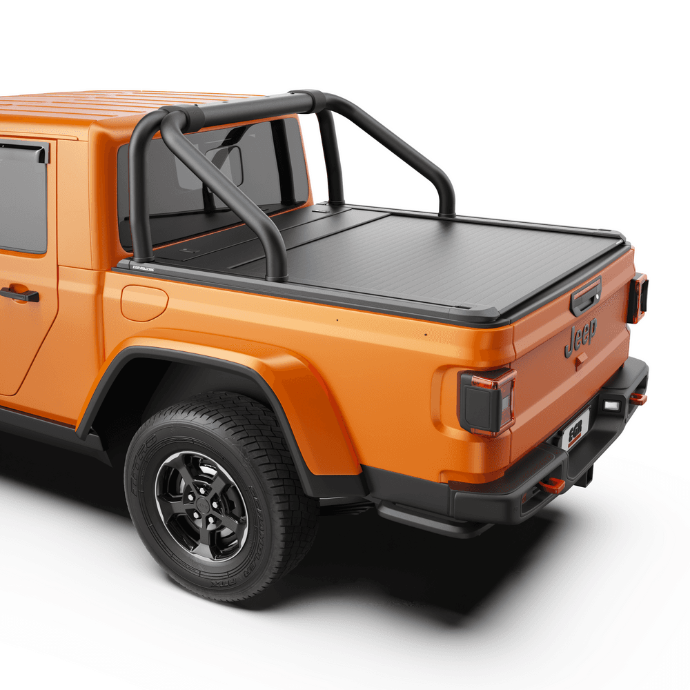 Red Jeep Gladiator with EGR RollTrac Electric E3 roller cover viewed from rear driver side, showcasing sleek tub protection.
