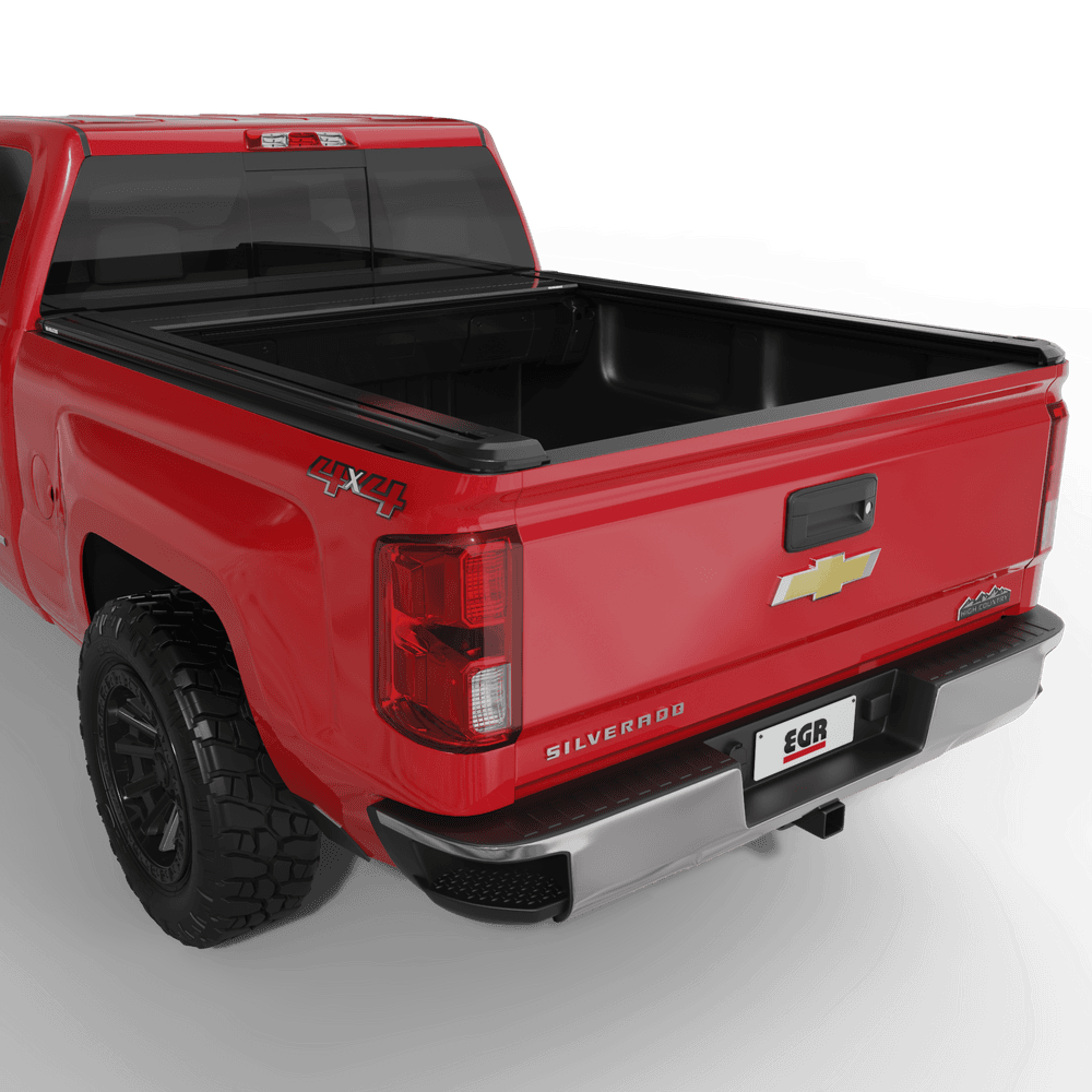 Chevrolet Silverado 2500 with EGR RollTrac Electric E3 tonneau cover partially open, showing smooth electric operation