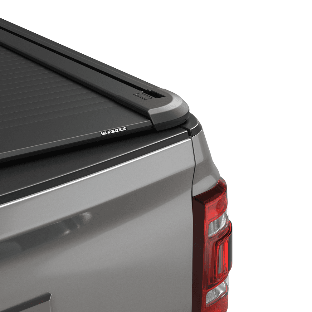 Closed EGR RollTrac Manual tonneau cover on RAM DJ 2500 with low-profile black powder-coated finish