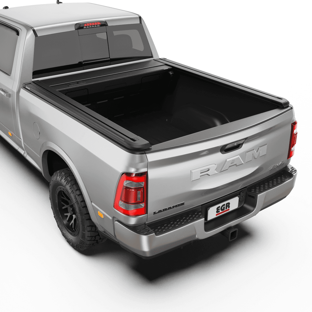 Open position of EGR RollTrac Manual roller cover on RAM DJ 2500, revealing secure aluminium slats