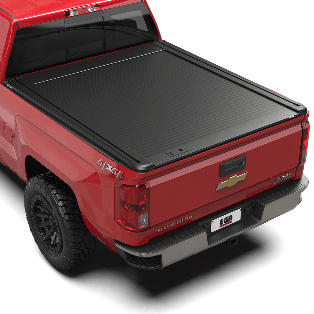 Chevrolet Silverado 2500 with EGR RollTrac Manual tonneau cover closed, showing low-profile aluminium slat design
