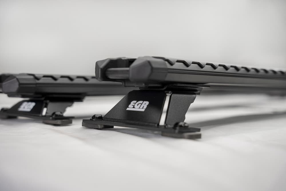 Side angle view of EGR GEN3 canopy crossbar rack kit highlighting low-profile fit and stable mounting points