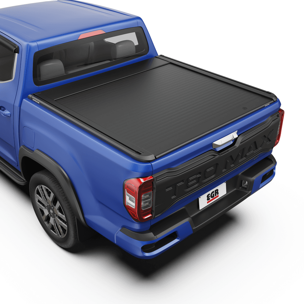 Rear three-quarter angle of an LDV T60 showing the closed EGR Auto RollTrac Manual tonneau cover