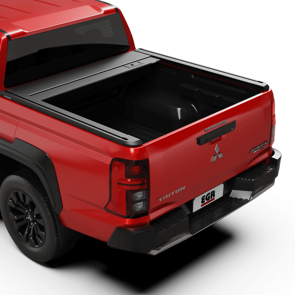 Rear angle of a Mitsubishi Triton MQ/MR featuring the EGR Auto RollTrac Manual Roller Cover fully opened for tub access