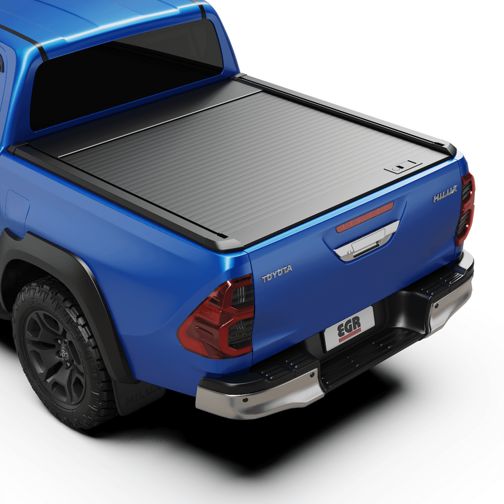 Rear three-quarter view of a Toyota Hilux 2015–2020 fitted with the EGR Auto RollTrac Manual Roller Cover closed