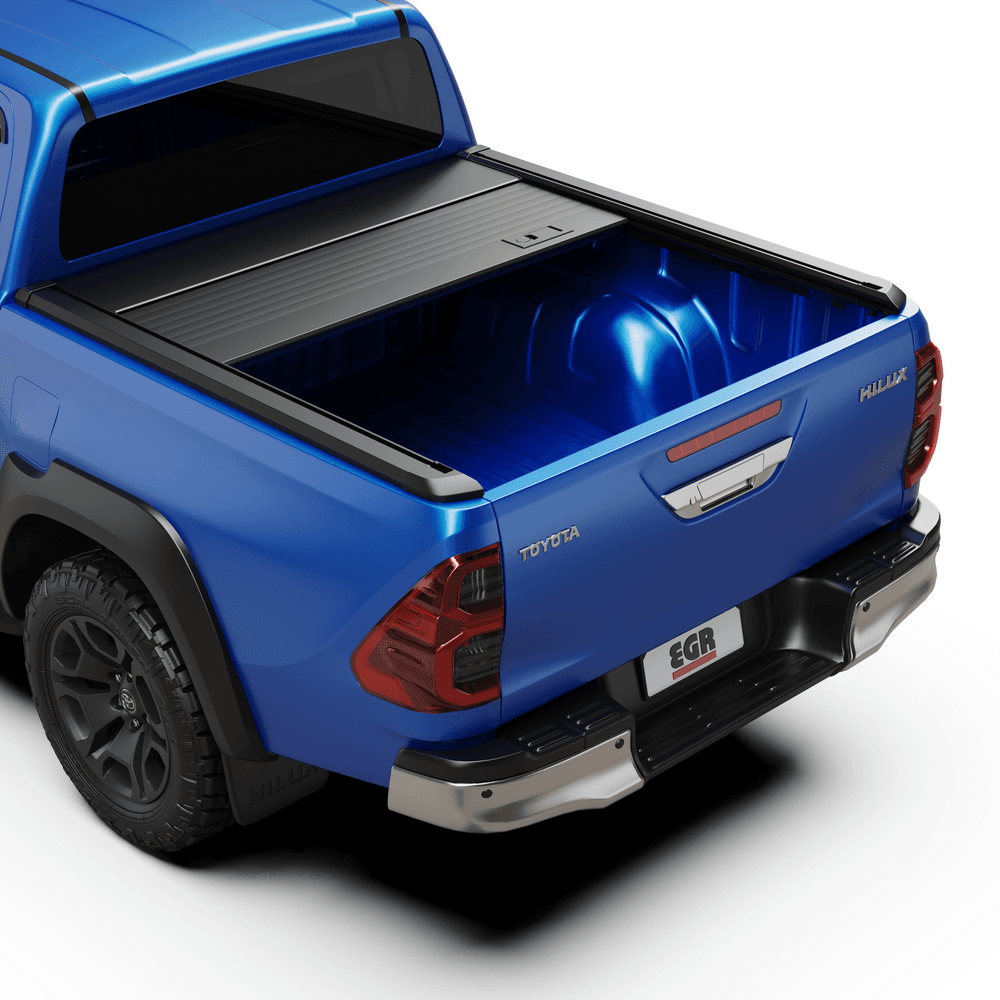 Toyota Hilux 2015–2020 with the EGR Auto RollTrac Manual Roller Cover partially open for easy tub access