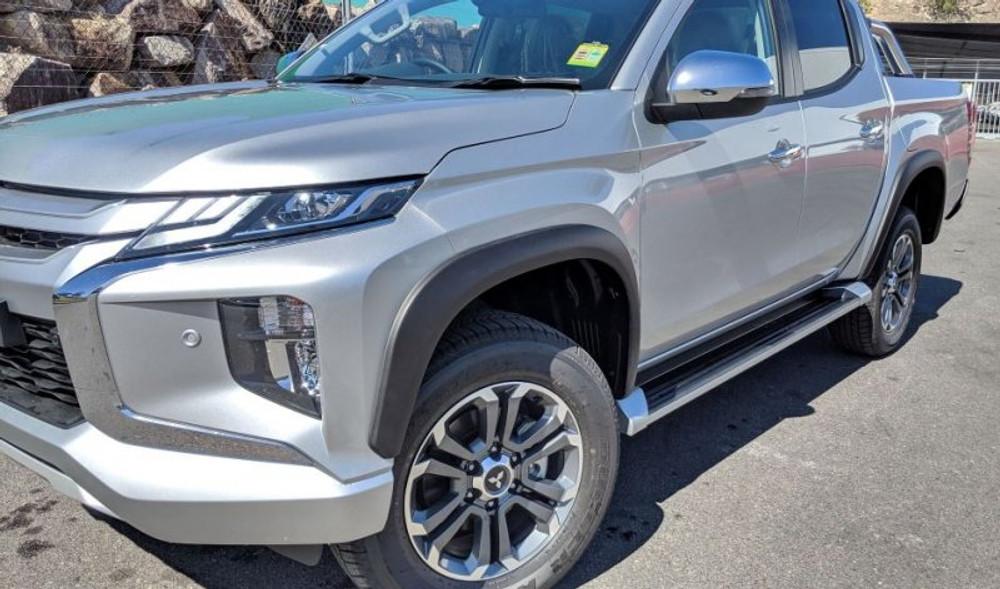 Side-angle view of Mitsubishi Triton MR upgraded with EGR Fender Flares, offering a tougher, wider stance