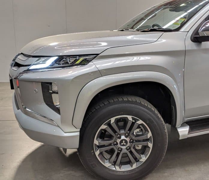 Close-up of Mitsubishi Triton MR EGR Fender Flares, showing secure fitment and durable ABS construction
