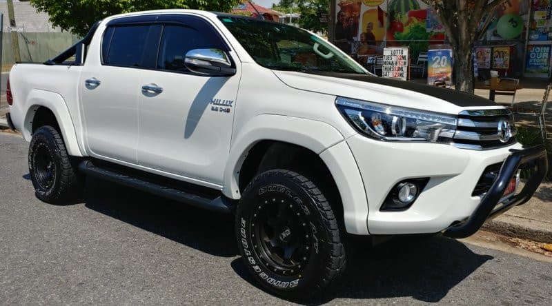 White Toyota Hilux 2015–2018 fitted with EGR Fender Flares for enhanced off-road styling
