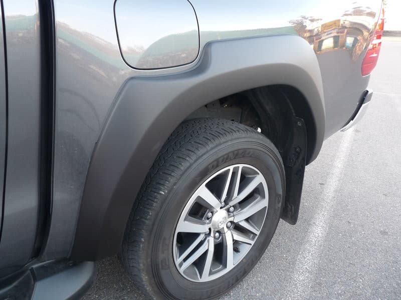 Close-up of Toyota Hilux front wheel arch equipped with EGR Fender Flares