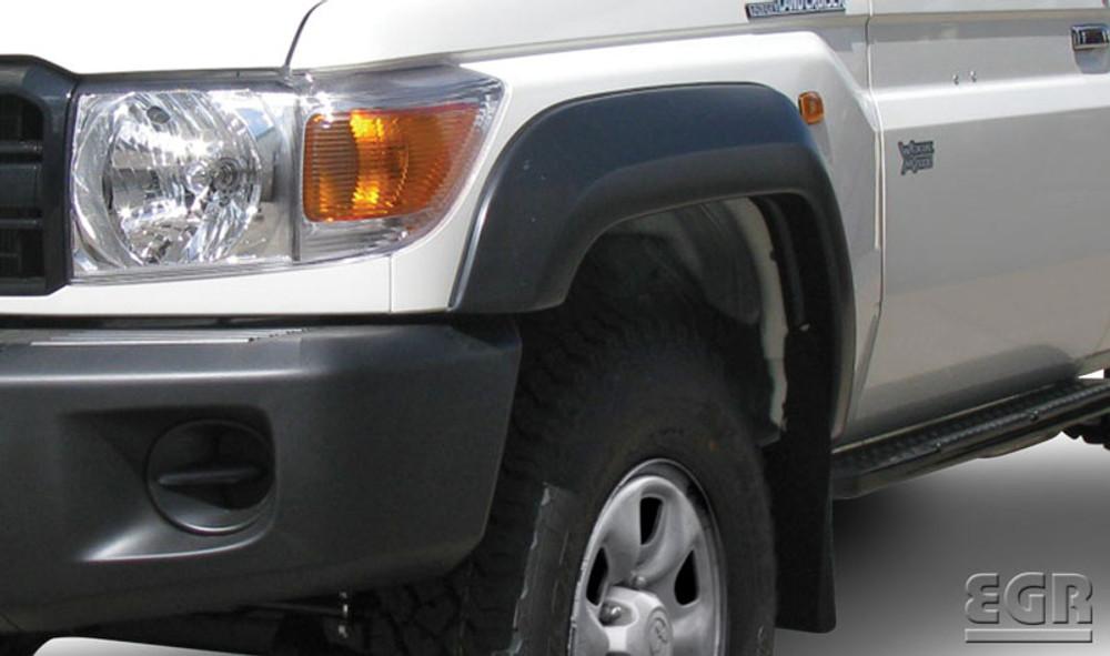 Toyota LandCruiser 70 Series Ute front quarter view showcasing EGR Fender Flares in Ultra Matte Black, fitted to enhance wheel coverage and off-road protection