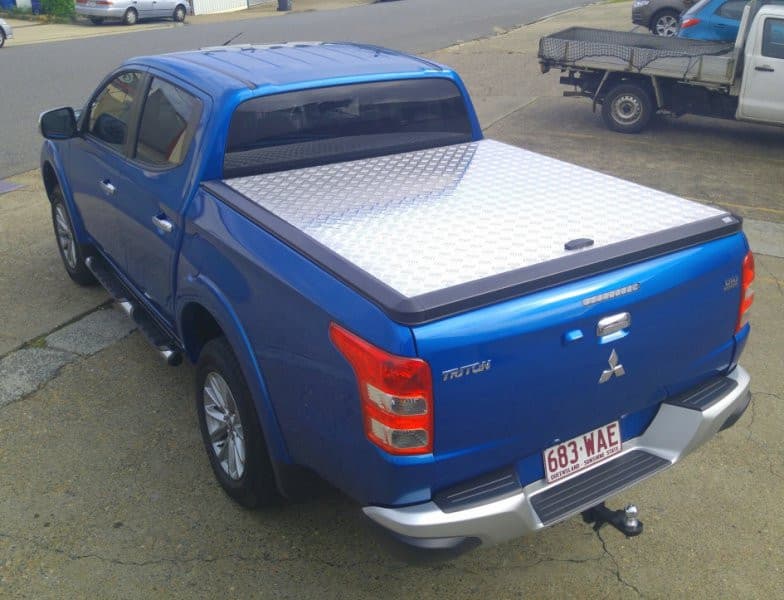 Blue Mitsubishi Triton MQ/MR with EGR Load Shield – tub cover securely fitted for everyday use