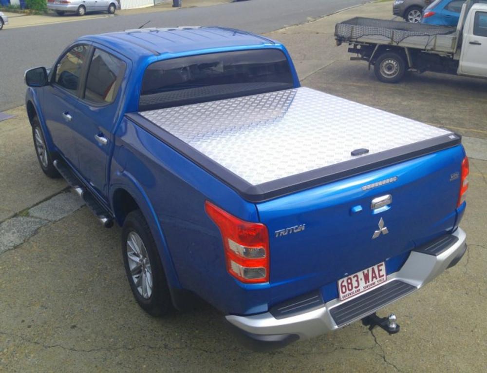 Blue Mitsubishi Triton MQ/MR with EGR Load Shield – tub cover securely fitted for everyday use