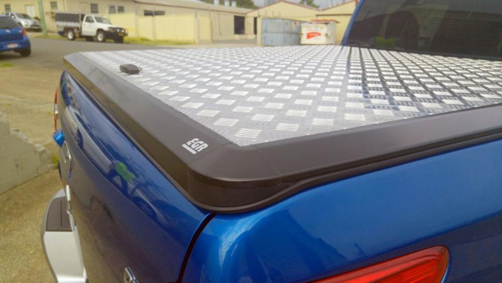 Mitsubishi Triton MQ/MR with EGR Load Shield – top-down rear angle showing UV-stable matte black finish
