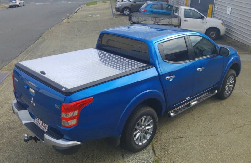 Blue Mitsubishi Triton MQ/MR sporting EGR Load Shield – rugged tub protection for work and adventure