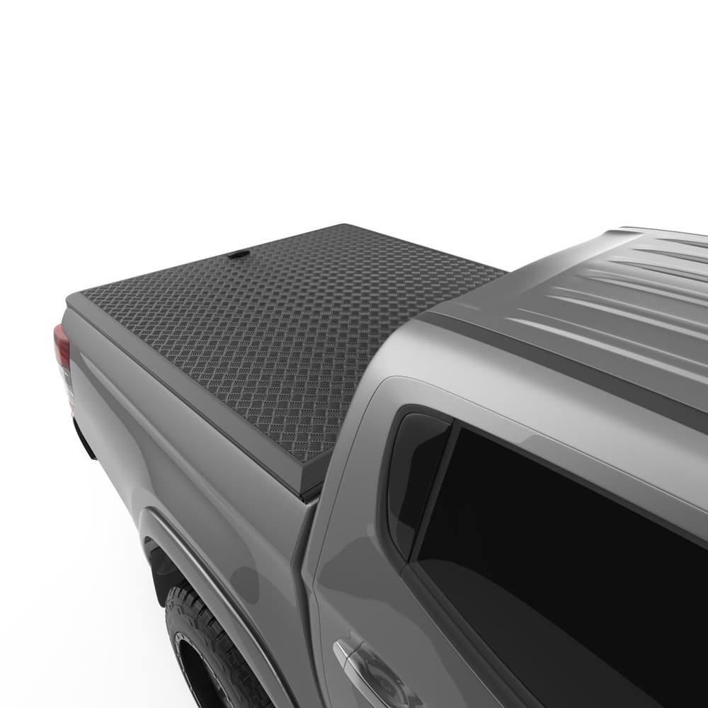Close-up of EGR Load Shield corner section on Mitsubishi Triton – heavy-duty aluminium checkerplate construction