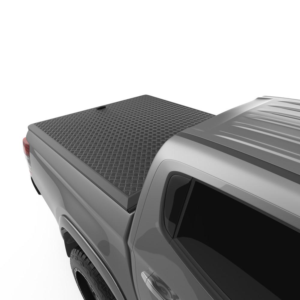 Close-up of EGR Load Shield corner section on Mitsubishi Triton – heavy-duty aluminium checkerplate construction