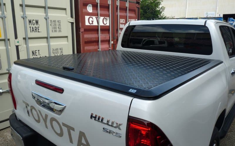White Toyota Hilux 2015 with EGR Load Shield – rear angle showing matte black powder-coated finish