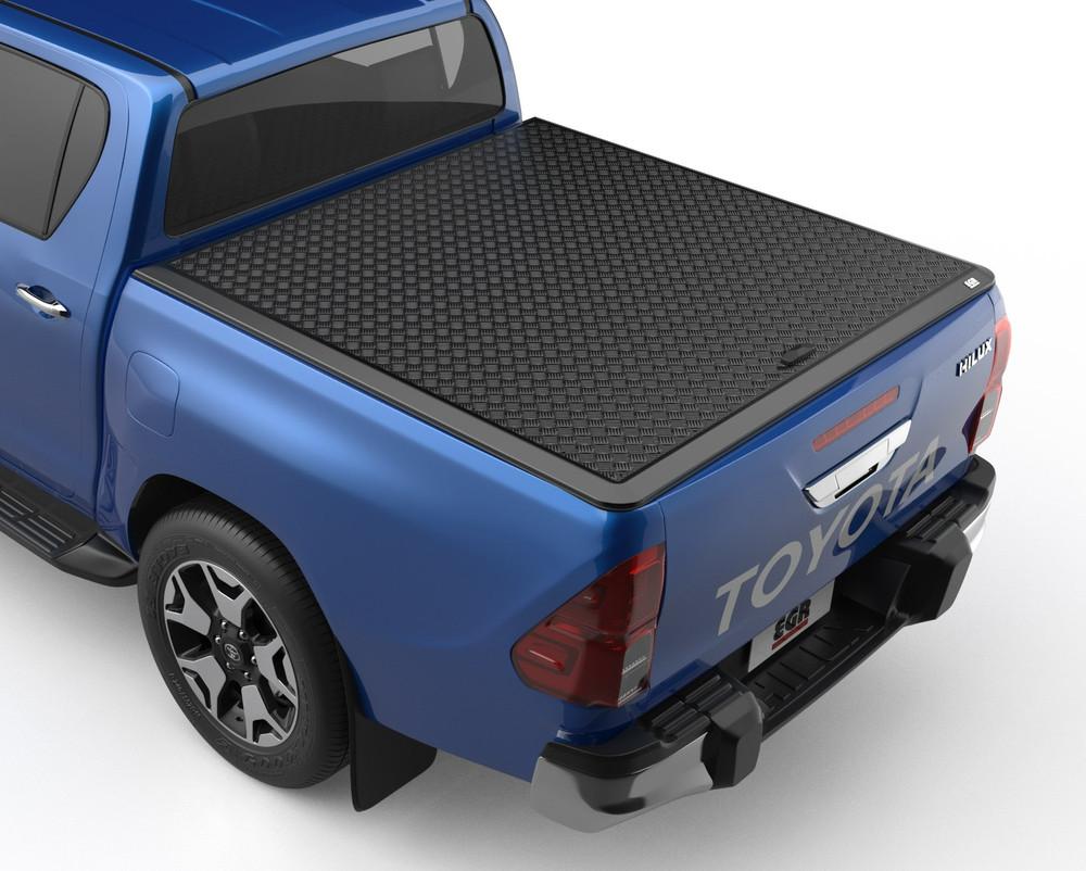 Toyota Hilux 2015 with EGR Load Shield fitted – rear three-quarter view showing aluminium checkerplate cover